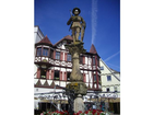 Marktbrunnen-mit-steinfigur-kaiser-maximilian-iii