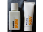Das-eau-de-toilette-in-der-flasche-und-das-duschgel-in-der-tube