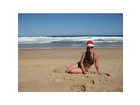 Ich-in-australien-mit-muetze-weihnachtsmann-ohrringen