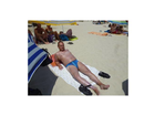 Nivea-sun-sonnenmilch-pflegend-lf-30-die-sonnenmilch-bei-mir-am-strand-im-einsatz