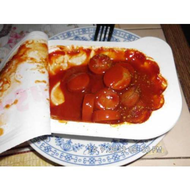 Quackys-currywurst