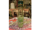 Die-flasche-mit-der-gruenen-lebensmittelfarbe